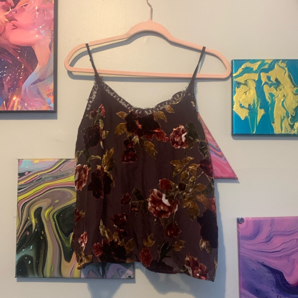 A medium tank top shirt in different shades of purple